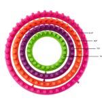 4 circle looms. The largest is pink, the next is orange, followed by purple, followed by green.