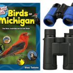 Book cover of "Bird of Michigan" on the left and on the right Two pairs of binoculars.