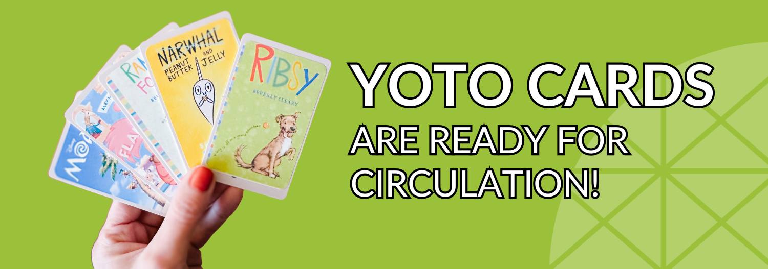Green background with an image of a hand holding colorful Yoto Cards. Text to the right reads "YOTO Cards are ready for circulation!"