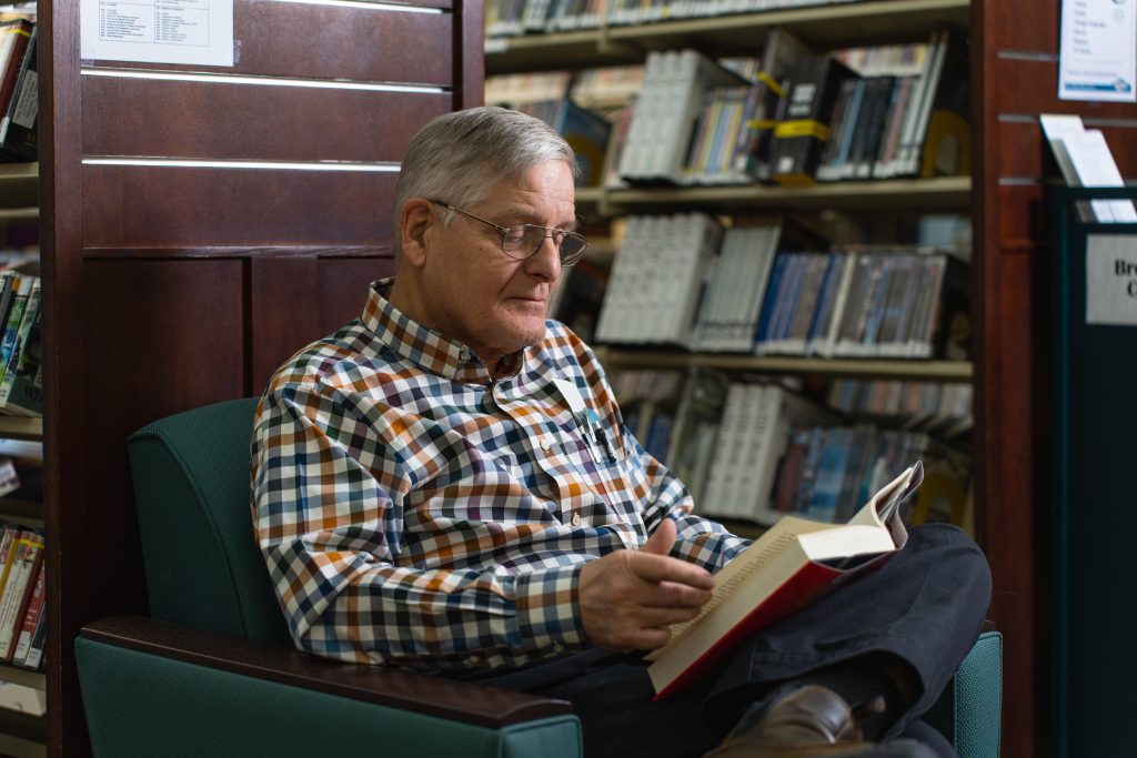 man reading a book