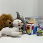 Youth Kit with stuffed lion, lamb and elephant animals, mini projector with accessories.