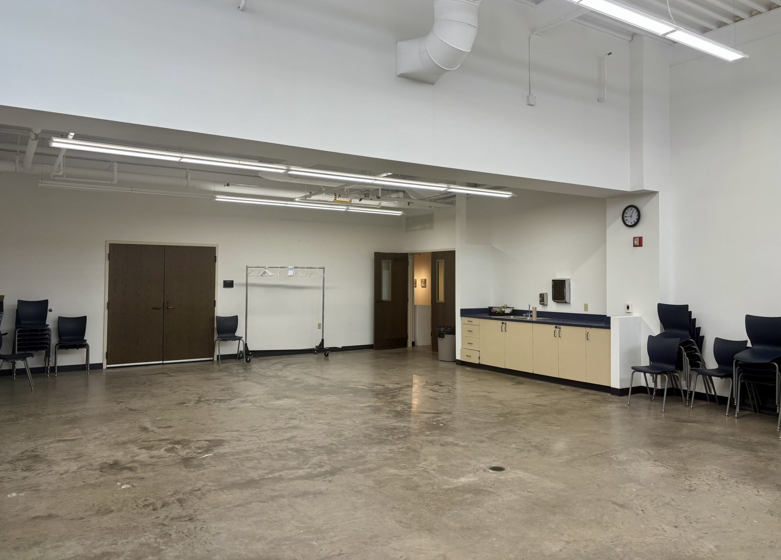 Large room with a sink and counter space.